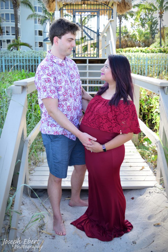 Maternity portrait with mom and dad at the beach